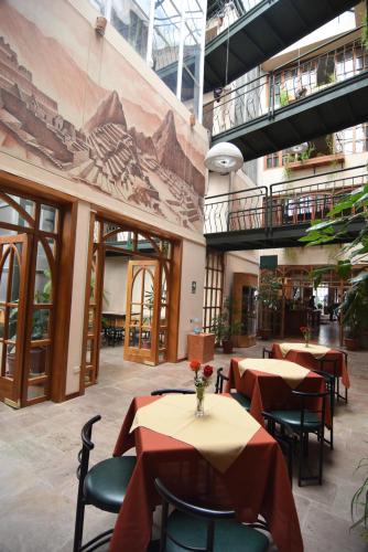 En restaurant eller et spisested på Hotel Prisma Cusco