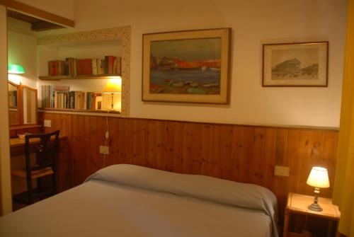 Letto o letti in una camera di Silence and relaxation for families and couples in the countryside of Umbria