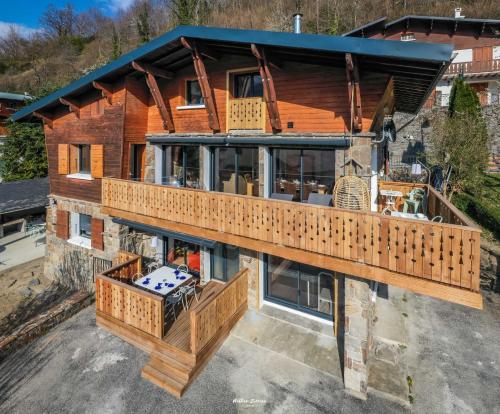 an overhead view of a house with a deck at Chalet Hygge Saint Lary - gîtes de standing en coeur de village des Pyrénées in Saint-Lary-Soulan