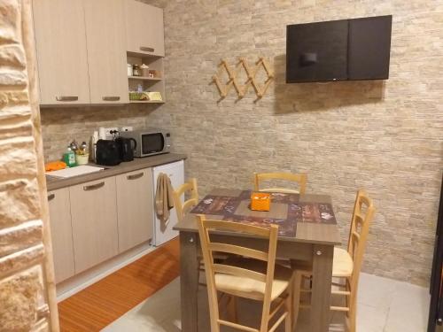 Kuchyň nebo kuchyňský kout v ubytování I Marchesi del Grillo - Vicinanze Stazione, Campus, Policlinico