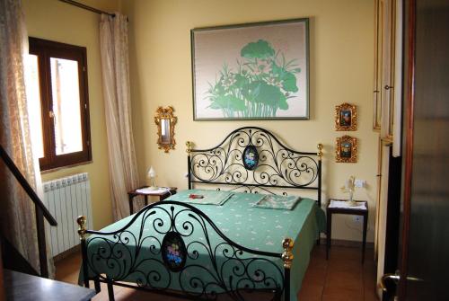 En eller flere senge i et værelse på Casa Vacanze Torretta