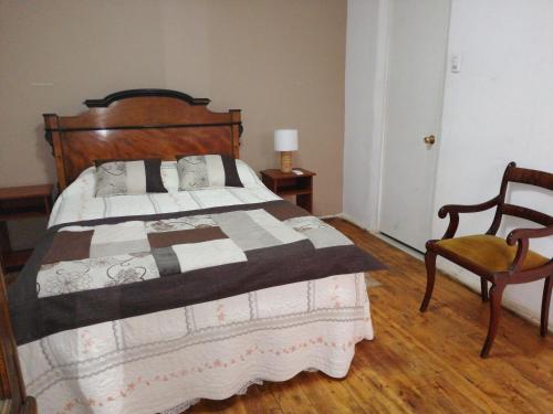 Hostal Viña Malvaにあるベッド