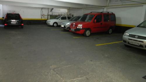 a group of cars parked in a garage at Hotel Makuxis - Brigadeiro in Sao Paulo