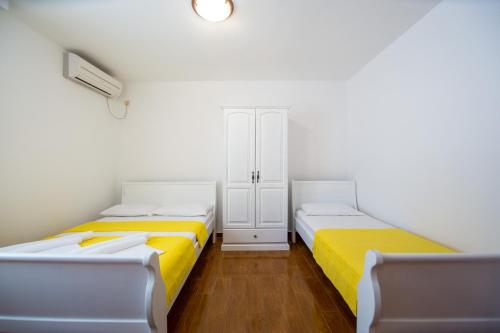 Postel nebo postele na pokoji v ubytování Villa DiEden