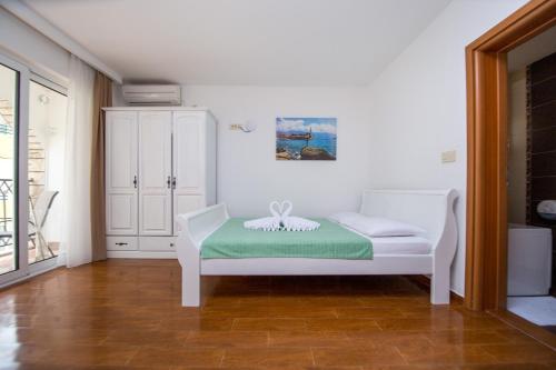 Postel nebo postele na pokoji v ubytování Villa DiEden