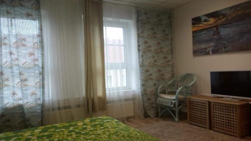 Μια τηλεόραση ή/και κέντρο ψυχαγωγίας στο Friedens apartment