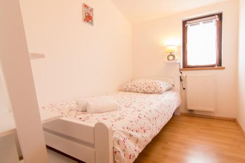 Posteľ alebo postele v izbe v ubytovaní Apartman Deni