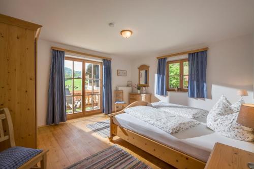 Un pat sau paturi într-o cameră la Lainthalerhof