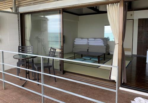 Un balcón o terraza de Hotel & Restaurant On the Beach Lue