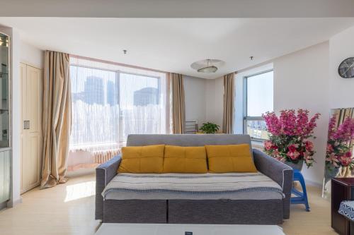 Area tempat duduk di Dalian Xiuzhu Mansion Apartment