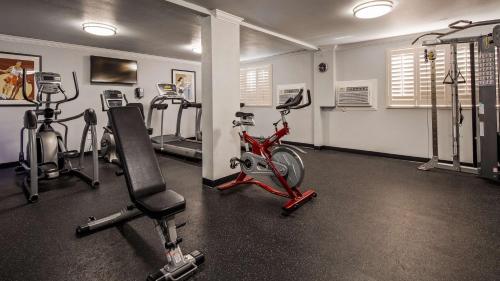 a gym with a bike and several exercise bikes at Lompoc Valley Inn and Suites in Lompoc