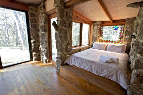 Tempat tidur dalam kamar di Snowy Wilderness