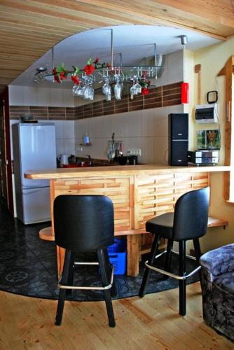 Η κουζίνα ή μικρή κουζίνα στο Guest House Vējaines