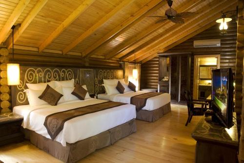 Katil atau katil-katil dalam bilik di Philea Resort & Spa