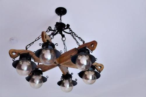 a chandelier hanging from a ceiling at 依比鴨鴨水岸會館 Ducking House in Ruisui