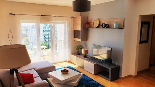 Ruang duduk di Gorgeous apartment in Portimão