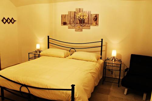 Cama ou camas em um quarto em B&B La Campanella