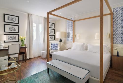 Ένα ή περισσότερα κρεβάτια σε δωμάτιο στο H10 Duque de Loule