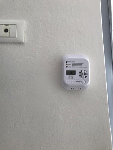 a white electrical outlet on a white wall at Casamina in Bellinzago Lombardo