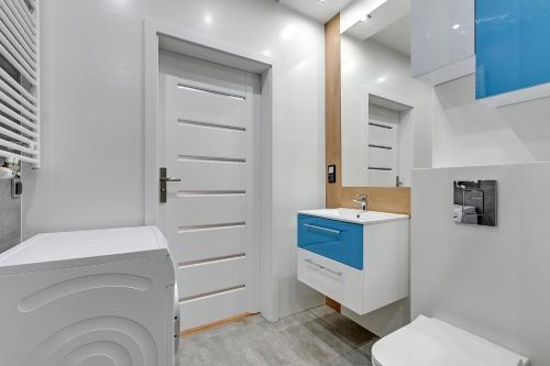 Un baño de NORDBYHUS Apartamenty Nowa Grobla