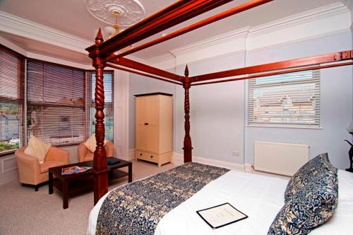 Ein Bett oder Betten in einem Zimmer der Unterkunft The Snowdon House