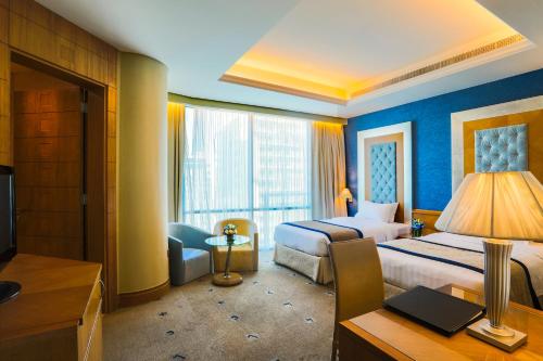 Ένα ή περισσότερα κρεβάτια σε δωμάτιο στο Social Hotel