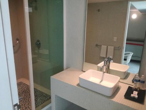 A bathroom at We Hotel Acapulco