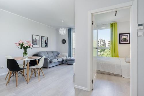Posteľ alebo postele v izbe v ubytovaní Elite Apartments Downtown Premium