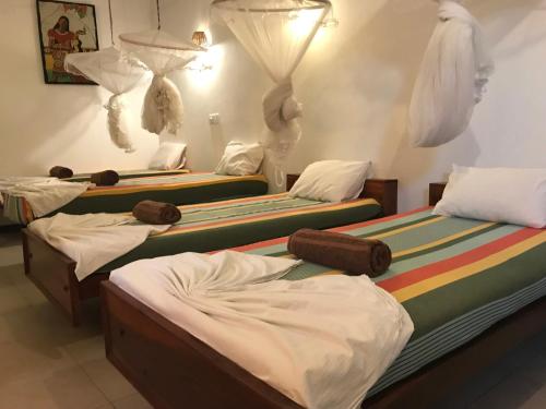 Katil atau katil-katil dalam bilik di Star Holiday Resort