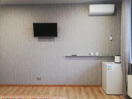 TV a/nebo společenská místnost v ubytování ObolonSky