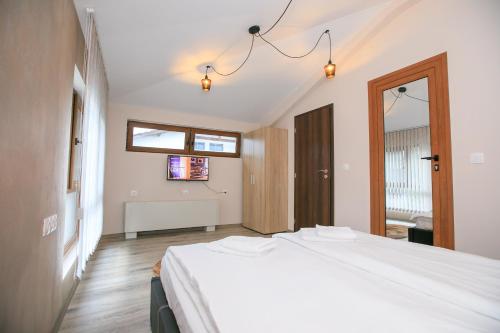 Ένα ή περισσότερα κρεβάτια σε δωμάτιο στο Апартаменти Принц и Принцеса