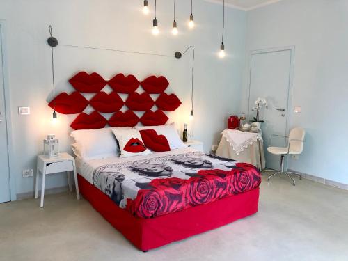 מיטה או מיטות בחדר ב-Incanto del Garda