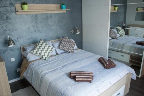 Postel nebo postele na pokoji v ubytování Sunshine Suites