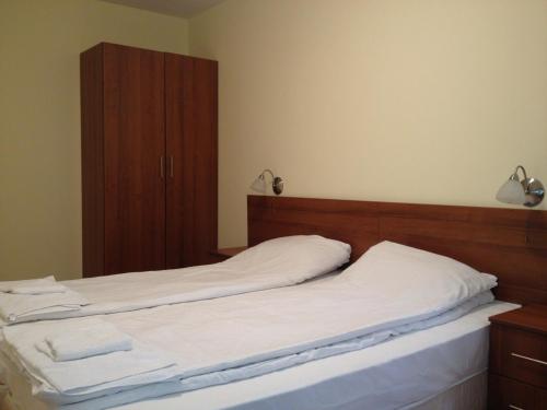 Una cama o camas en una habitación de Ski Apartment in Castle Complex