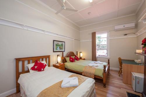 Postel nebo postele na pokoji v ubytování Pure Land Guest House