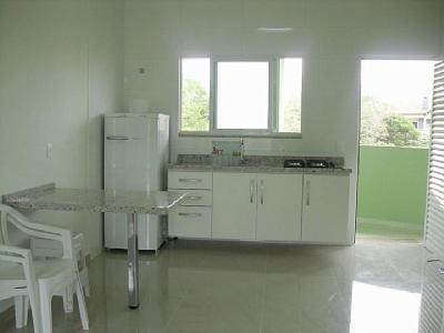 Paraíso do Santinho Apartamentos tesisinde mutfak veya mini mutfak