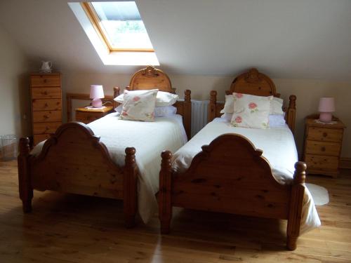 Cama o camas de una habitación en Annagh Cottage