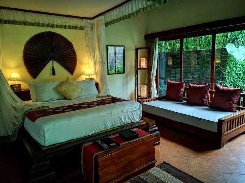 A bed or beds in a room at Villa Nirvana