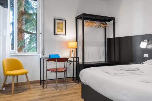 Postel nebo postele na pokoji v ubytování ParcoSantaTeresa Suites LOC-02279