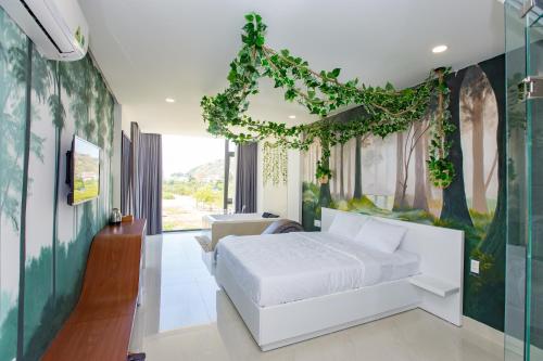 Postel nebo postele na pokoji v ubytování Romely Hotel Nha Trang