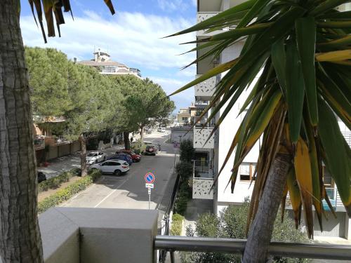 a view of a street from a balcony of a building at Casa Luca in Silvi Marina