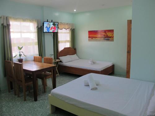 Postel nebo postele na pokoji v ubytování Cool Stay Inn