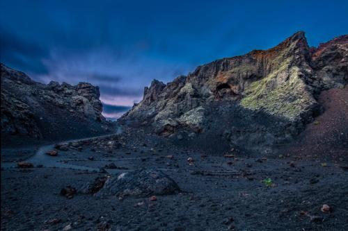 a view of a rocky mountain at dusk at Los Lirios Hotel Rural - Adults Only in Tías