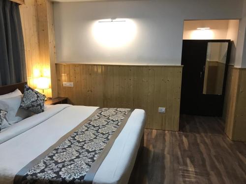 Postel nebo postele na pokoji v ubytování BluBen Alpine