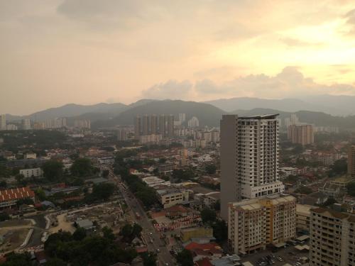 a view of a city with buildings and mountains at Strait Garden Suites X Ace Pro @ George Town in Jelutong