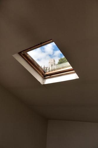 a skylight in the ceiling of a room at Chiama Ride the Beauty Assisi in Assisi