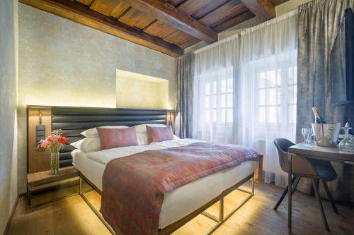Postel nebo postele na pokoji v ubytování Hotel Waldstein