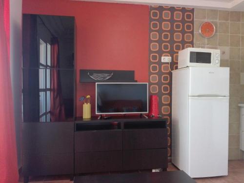 Kuchyň nebo kuchyňský kout v ubytování Orlando Apartments