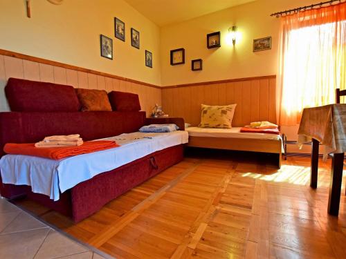 Postel nebo postele na pokoji v ubytování Apartments Pinka