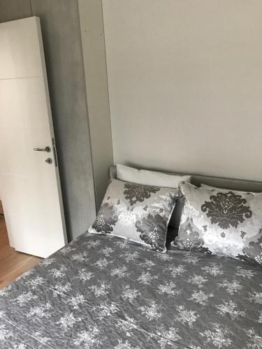 Postel nebo postele na pokoji v ubytování Apartman Oslo